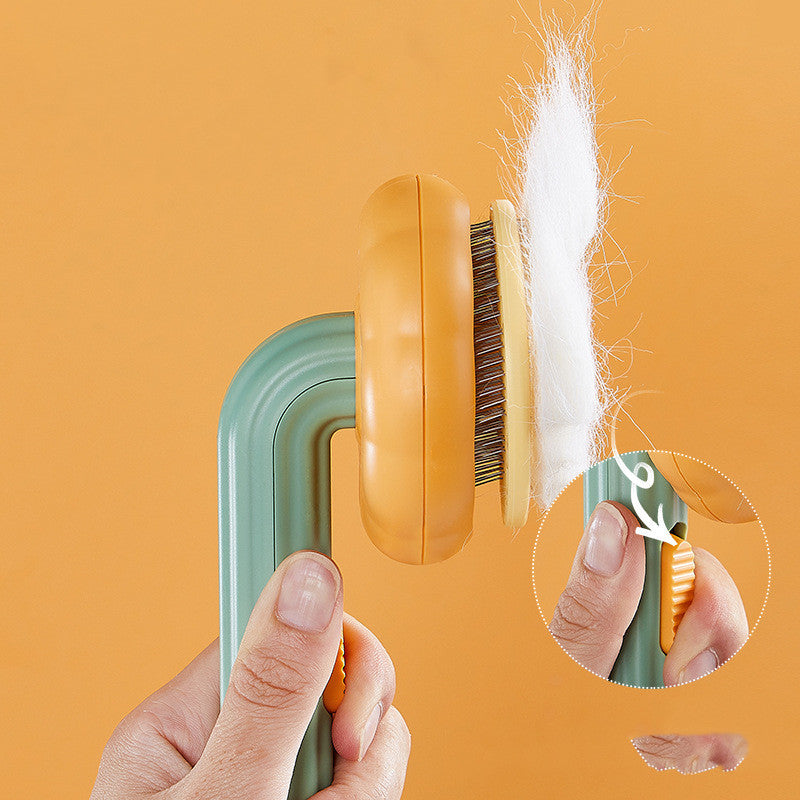 New Pet Cat Brush Hot Selling Hand-held Steel Wire Self-cleaning  Comb Looper For Hair Removal